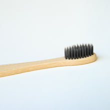 Load image into Gallery viewer, Biodegradable Charcoal Infused Bamboo Toothbrushes (single or set of 4)