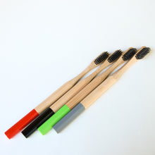 Load image into Gallery viewer, Biodegradable Charcoal Infused Bamboo Toothbrushes (single or set of 4)